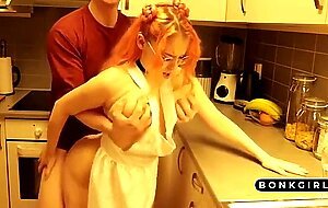 Amateur kitchen fucking with a big titty redhead