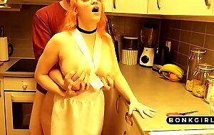 Amateur kitchen fucking with a big titty redhead